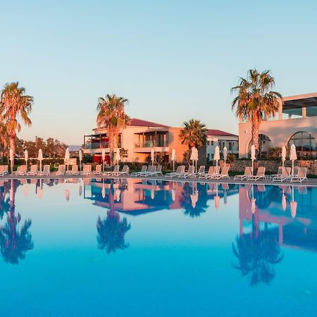 Almyros Beach Almiros Beach Exterior foto The resort at sunset